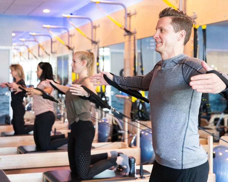 How to Maintain a Fitness Routine During Stressful Times - interior of Club Pilates studio