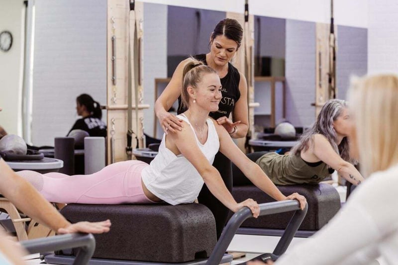 Reformer Pilates North Lakes - Club Pilates member on a reformer